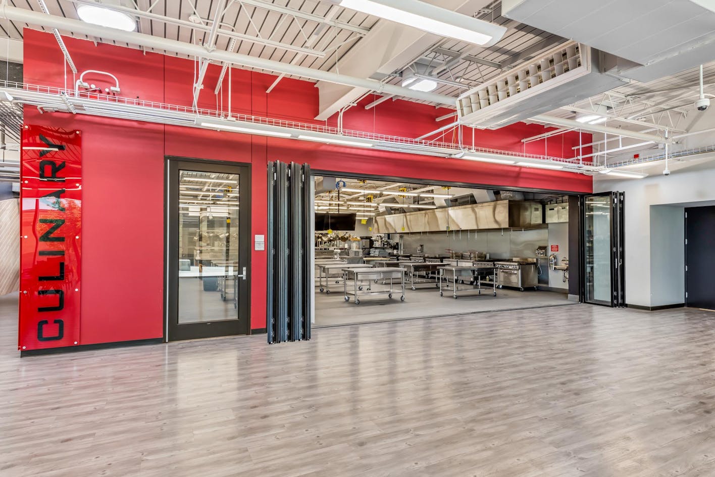 career and technical education center for high school students to learn with folding glass walls